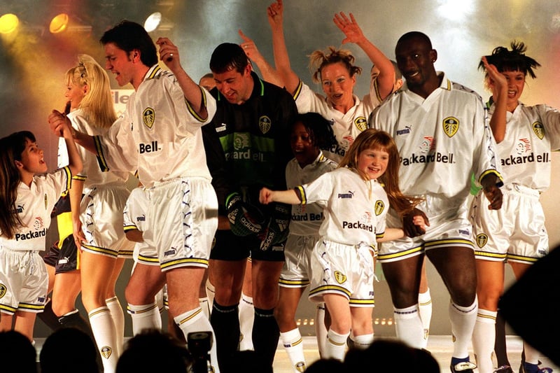 Lee Sharpe, Nigel Martyn and Jimmy Floyd Hasselbaink on the catwalk in the new strip at the Leeds United Fashion Show.