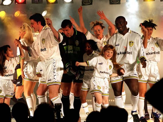 Lee Sharpe, Nigel Martyn and Jimmy Floyd Hasselbaink on the catwalk in the new strip at the Leeds United Fashion Show.