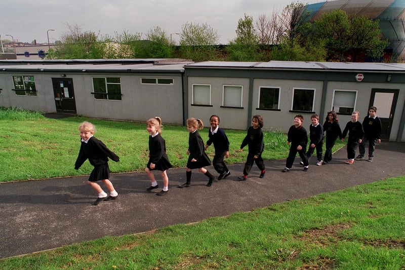 Pupils leaving the temporary classrooms at Little London Primary School.