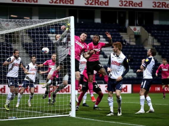 Goalmouth action for PNE's 3-0 win over Derby at Deepdale.