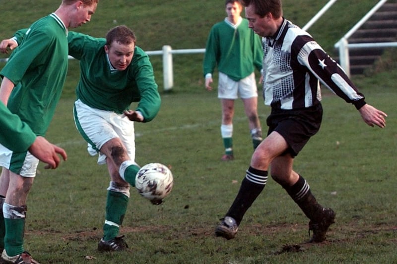 January 2003 and Nicky Baldwin of Rothwell Athletic shoots against Armley Athletic.