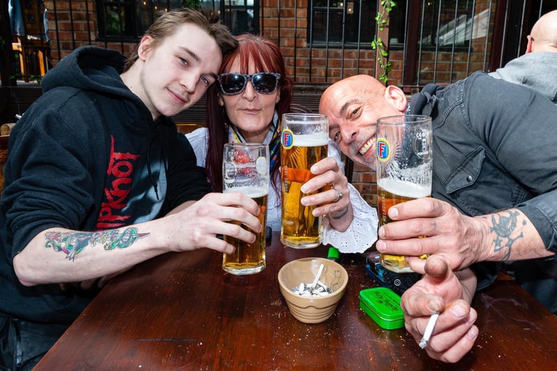 Andy Tyler Lowther, Ivan Earle and Annie Sherrington enjoy a drink in The Wellington, Preston.