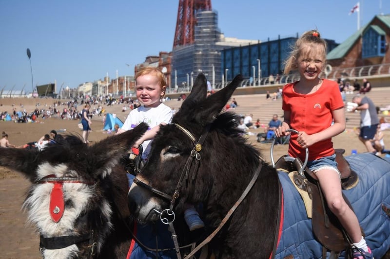 Walter and Chelsea-Mia Sawyer, aged 2 and 9, enjoying a donkey ride.