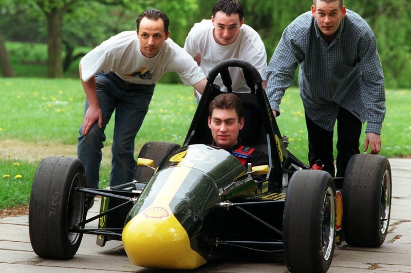 Leeds University Mechanical Engineering students had made a mark 3 racing car. Pictured are Jonathan Stephenson, Matt Hall and Andrew Deakin all pushing as Blake Siegler takes the steering wheel.