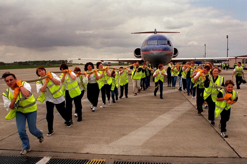 Staff from British Midland were taking part in a sponsored aircraft pull at Leeds and Bradford Airport to raise funds for the NSPCC.