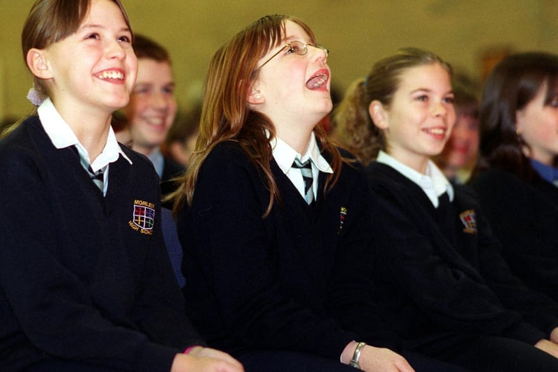 Morley High pupils  laugh at Dan Roro, a French clown during his performance at the school in January 2000.