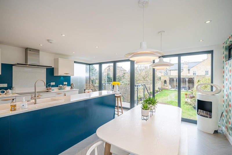 The modern rear extension houses the dining kitchen.