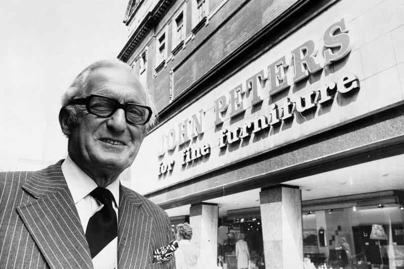 June 1975 and millionaire Manny Cussins is pictured outside one of his Leeds stores.