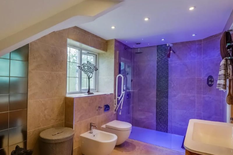 Fitted with a quality suite comprising walk in wet room shower with Mosaic tiled floor and t-bar thermostatic shower, pedestal wash basin and a close coupled low flush w.c., fully tiled walls, Porcelain tiled floor, extractor fan and heated towel radiator.