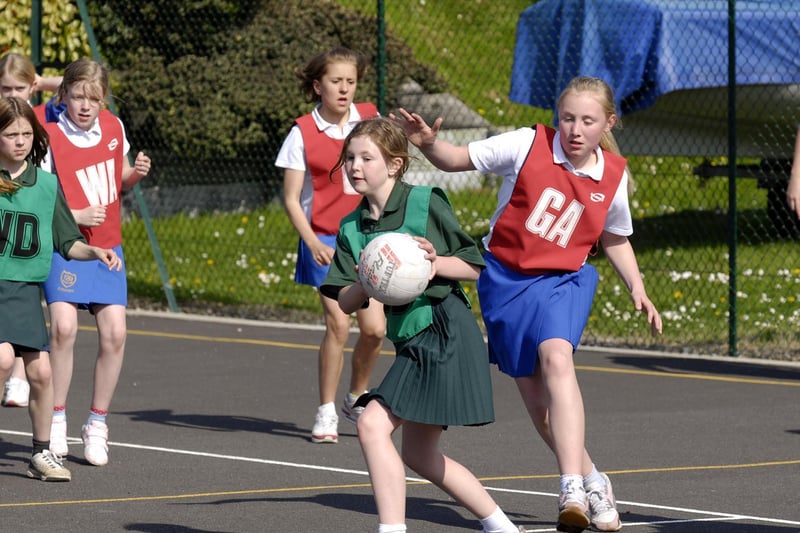 Action from Lindhead (green) v Gladstone Road at a primary school netball tournament.