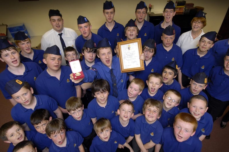 Chris Sedgwick, centre, newly promoted sergeant with the 5th Scarborough Boys Brigade, gains the Queen’s Badge. Chris is pictured with the company.