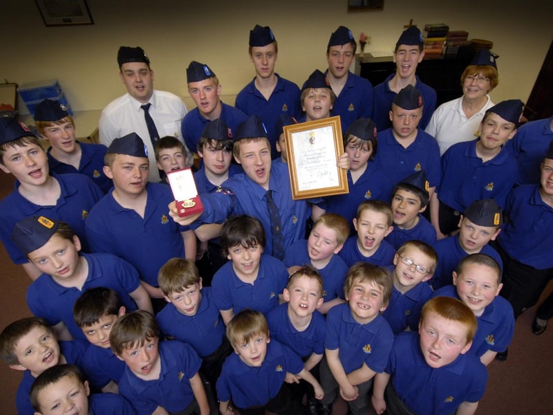 Chris Sedgwick, centre, newly promoted sergeant with the 5th Scarborough Boys Brigade, gains the Queen’s Badge. Chris is pictured with the company.