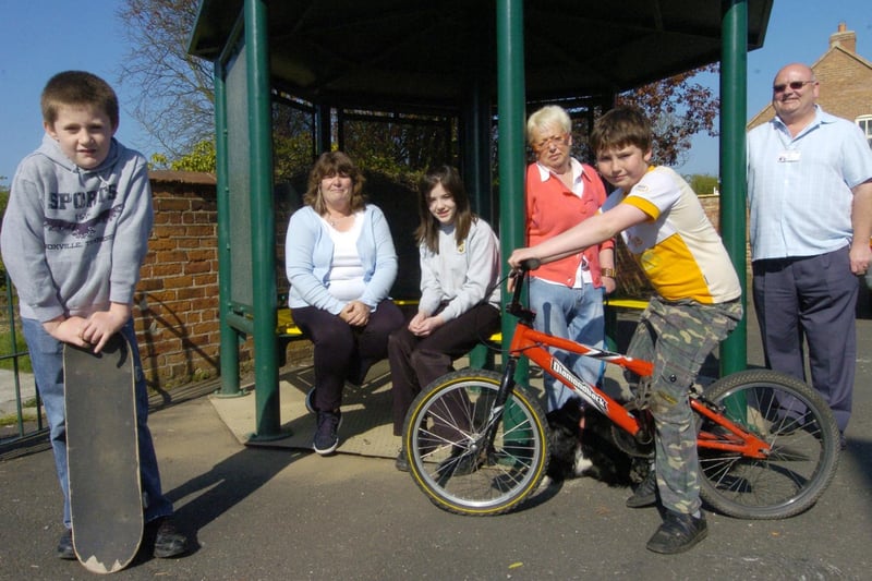 Trying out the Hunmanby youth shelter, from left, Luke Stanger, Cllr Lavinia Kirk, Samantha Stanger, Cllr Liz Mullin, Callum Grimwood, and John Casey.
