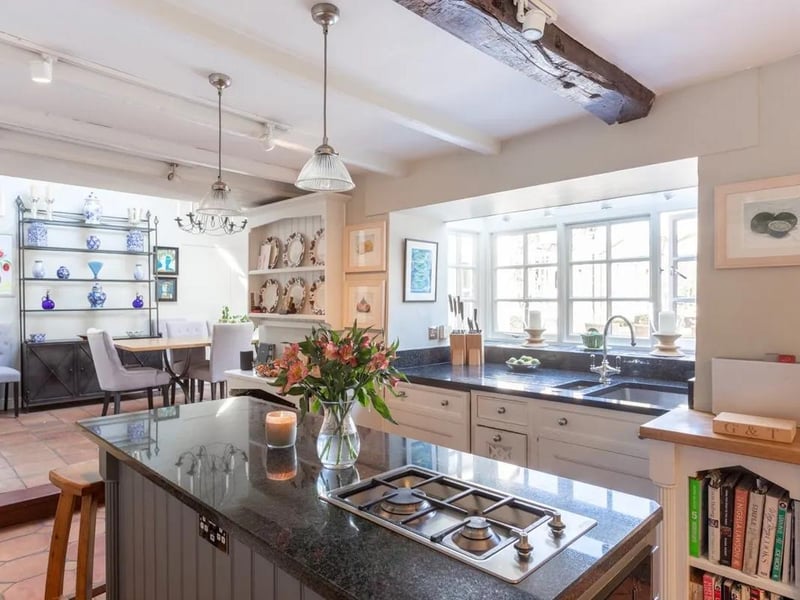 The kitchen opens through to a dining area