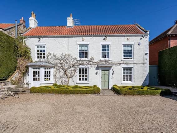 This Scalby home, converted from a Georgian house and a coach house, is highly individual, with lovely gardens.