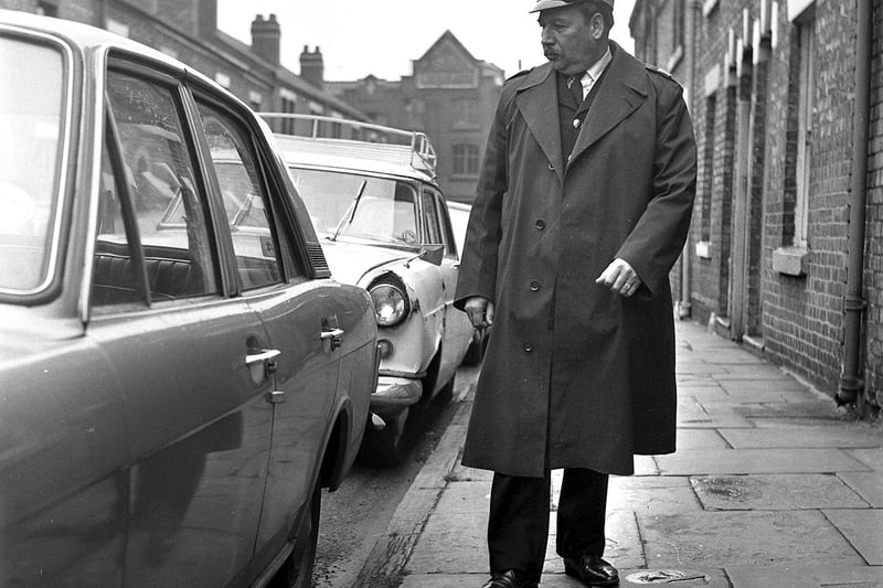 A traffic warden on the streets of Wigan in 1970