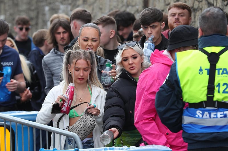 Revellers arrive at Circus nightclub in Bramley-Moore Dock, Liverpool, for a Covid safety pilot event which will be attended by around 3000 people (photo: PA).