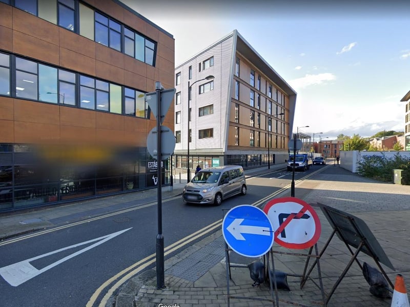 Maybe this picture looks more familiar. The piece of land now stands Escabar on Back Lane.