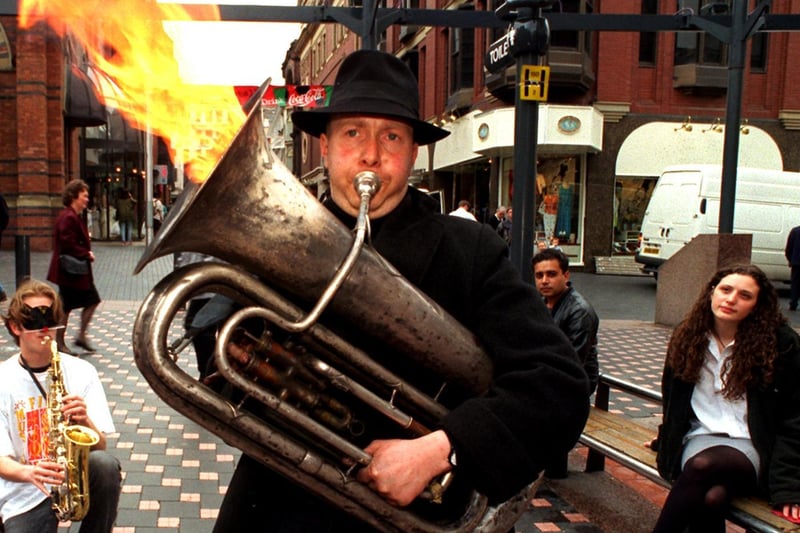 Musician Sam Paechter set fire to his tuba in Lands Lane. It was to launch Music, Fire and Masks, a 30 day street entertainment festival for Euro 96.