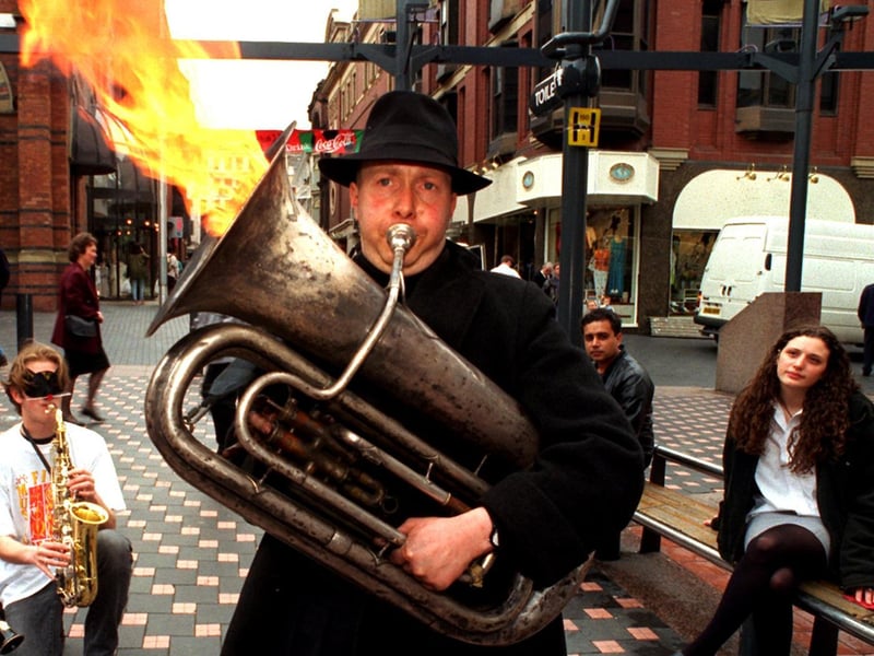 Musician Sam Paechter set fire to his tuba in Lands Lane. It was to launch Music, Fire and Masks, a 30 day street entertainment festival for Euro 96.