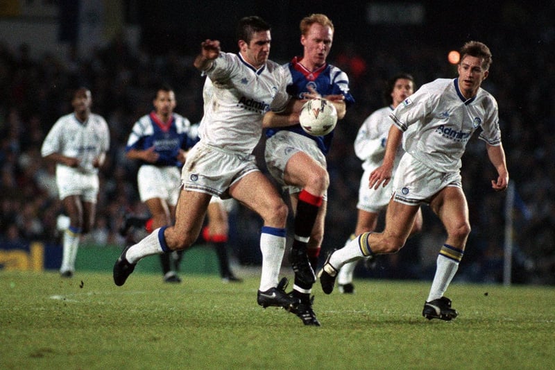Eric Cantona battles for the ball during the European Cup second round, second leg against Glasgow Rangers at Elland Road in November 1992. He scored as the Whites lost 2-1 on the night and 4-2 on aggregate.