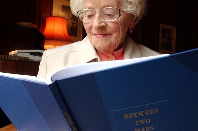 This is Irene Paul from Harehills, with a bound copy of her life story which was presented to her by the Lord Mayor of Leeds Coun Neil Taggart at the Civic Hall in April 2004.