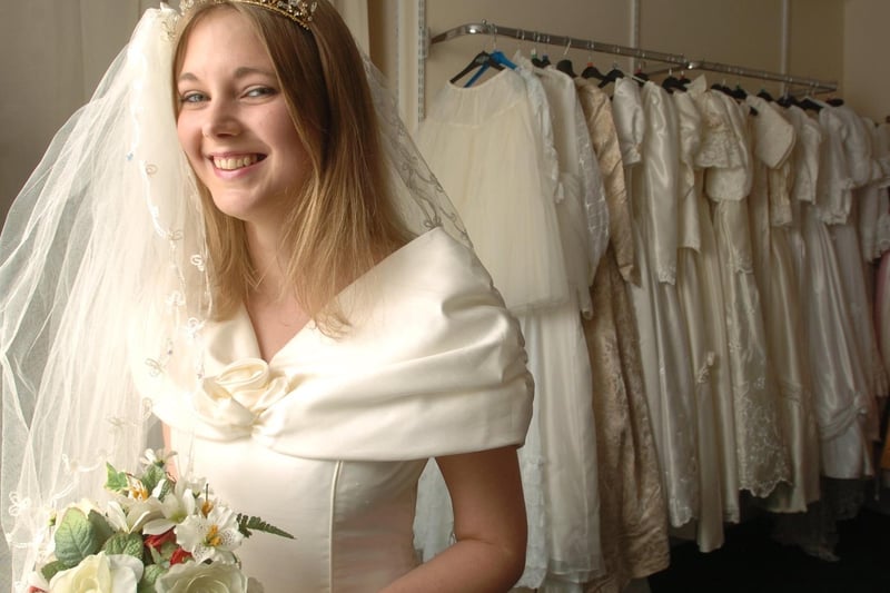 July 2004 and St Gemma's Hospice charity shop in Harehills opened a Bridal Warehouse. Pictured is deputy manager Hannah Metcalfe modelling a dress.