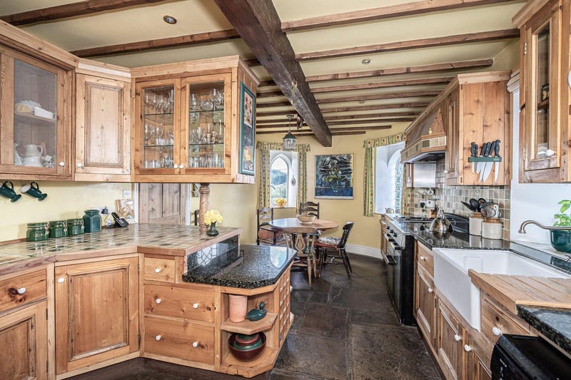 A large, family kitchen and dining area bursting with period charm.