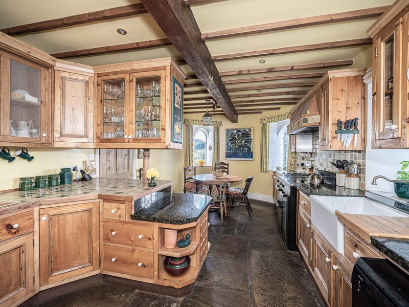 A large, family kitchen and dining area bursting with period charm.