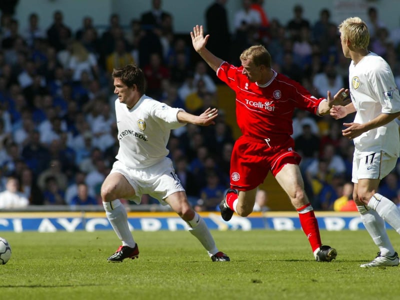 Harry Kewell shields the ball from Middlesbrough's Colin Cooper.