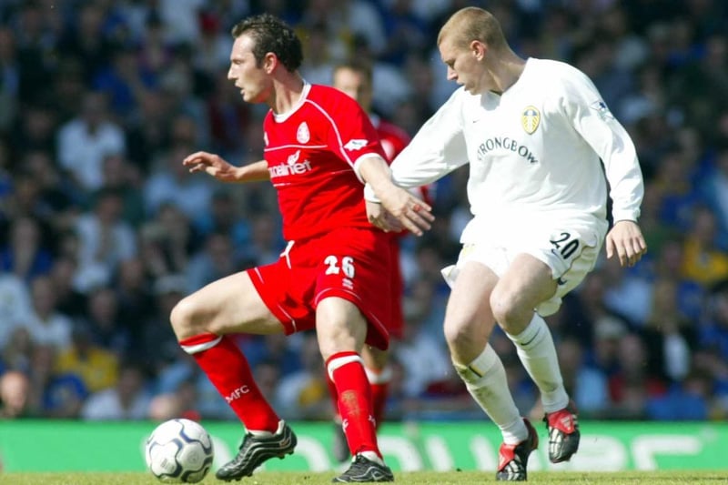 Middlesbrough striker Noel Whelan protects the ball from Seth Johnson.