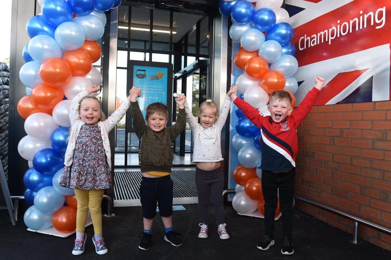 Dorothy, James, Ava and Harry jump for joy as they get a special tour of the new Aldi near their nursery, photo by Neil Cross.