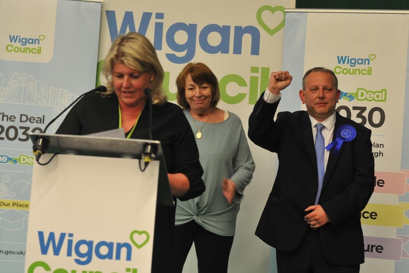 From left, Wigan Council chief executive Alison Mackenzie-Folan announces Orrell ward result, two seats, Marjorie Clayton and Michael Winstanley celebrate.
