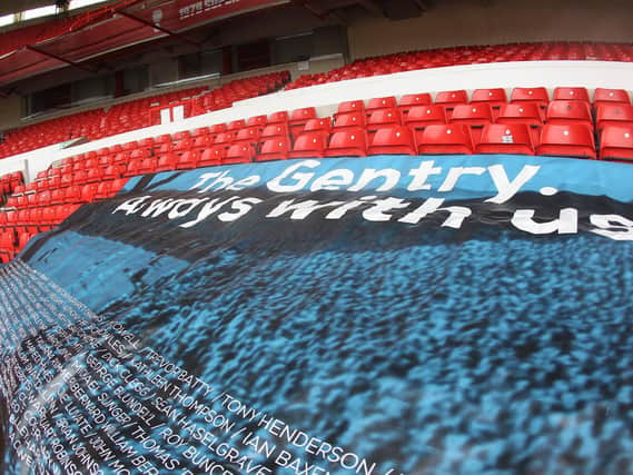 The Gentry flag was spread over seats in the empty away end at the City Ground