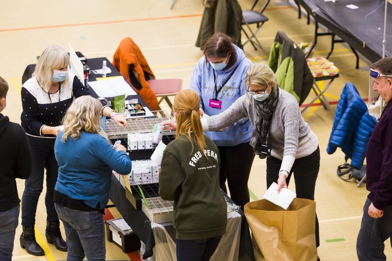Volunteers and officials at the count