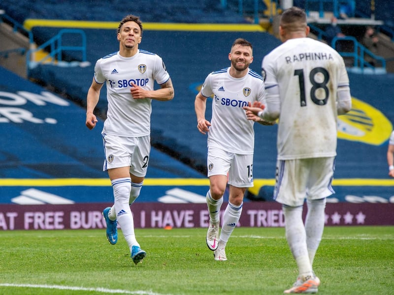 Rodrigo, left, heads off to celebrate with Raphinha, right, after the Brazilian's assist as a delighted Stuart Dallas closes in. Picture by Bruce Rollinson.