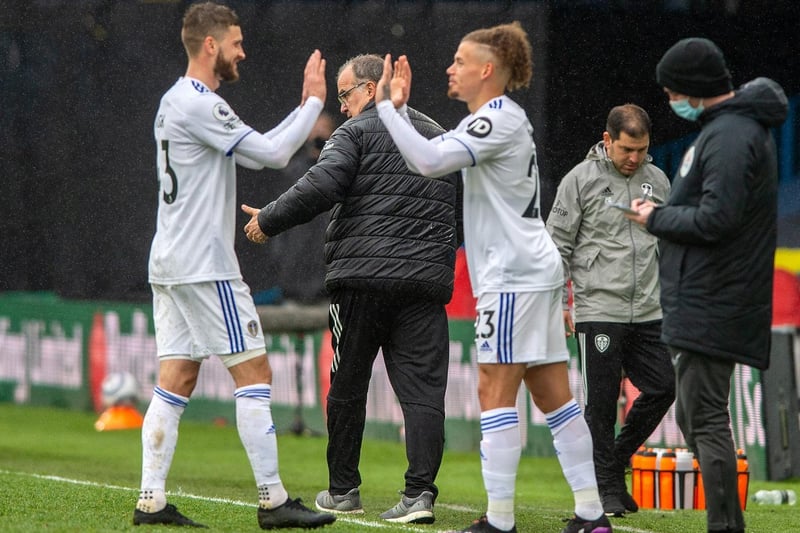 England international midfielder Kalvin Phillips replaces Polish international Mateusz Klich as a 89th-minute sub with victory in the bag as both show their delight and Bielsa gives a thumbs up. Picture by Bruce Rollinson.