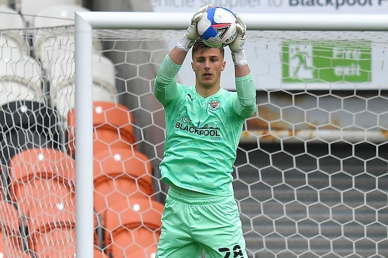 A little nervy on the ball and survived one scare, but made some important saves on his Blackpool debut.