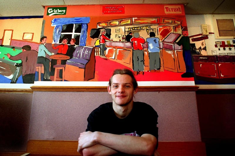 April 1997 and pictured is artist William Rushworth with his mural at Hawkhill Social Club in Guiseley.