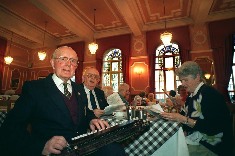 George Williams plays his Japanese mandolin for pensioners at Harry Ramsden's restaurant in February 1997.