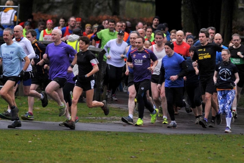 Runners take part in the Haigh Woodland Park Run on New Years Day, January 2017.