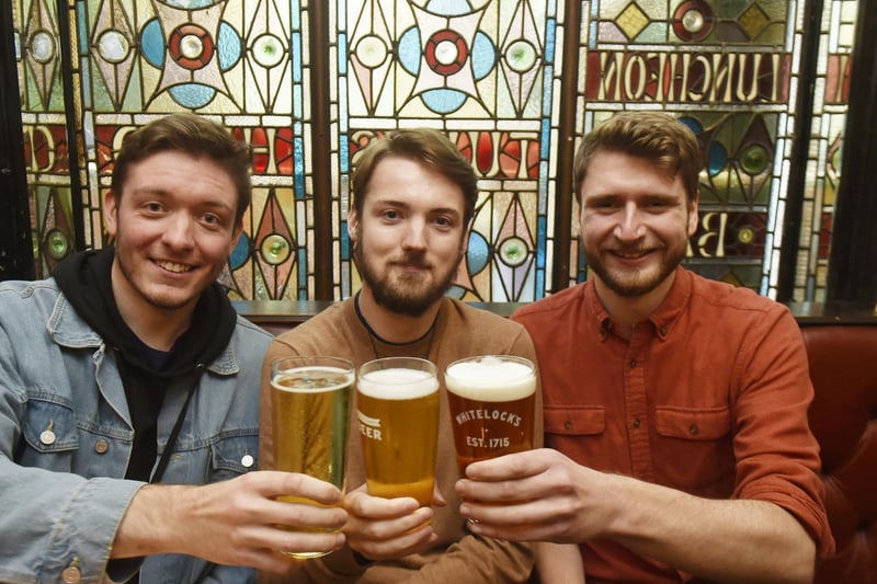 Luke Neild, Jack Kirk and Thomas Walker are friends who met at uni. They enjoyed a reunion pint at Whitelocks in Leeds (photo: Steve Riding)