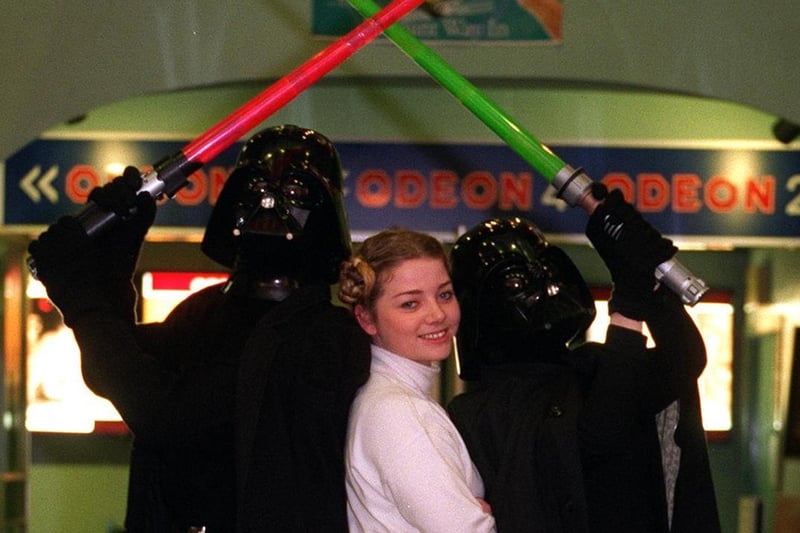 The Star Wars trilogy opened at the Odeon cinema with staff dressed up for then occasion. Pictured, from left, Steve Jacklin, as Darth Vader 1, Samantha Murphy, as Princess Leia, and Stephanie Lennon, as Darth Vader 2.
