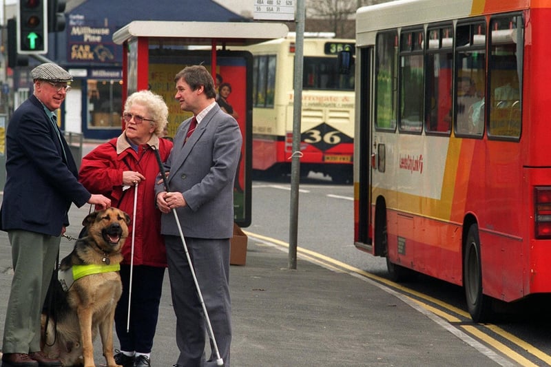 Campaigners were celebrating victory to save free bus passes for the blind. Pictured at a city centre bus stop are campaigner Ivy Needham with Alan Oldroyd and Barry Naylor from the National Federation of the Blind.