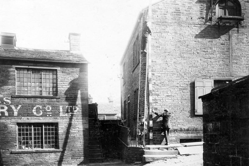 Back of premises on Town Street in May 1909. To the left is the Sanitas Steam Laundry.