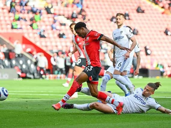 ON THE SCENE: Leeds United's England international midfielder Kalvin Phillips looks to tackle Southampton's lively Nathan Tella. Photo by Dan Mullan/Getty Images.