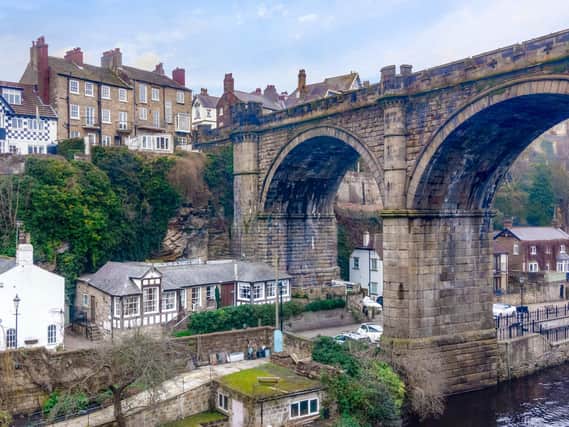The house, left, sits next to naresborough viaduct, which was opened on on October  1,1851. It has castellated walls and piers to blend in with the ruined walls of Knaresborough Castle and consists of four arches and three piers, the middle of which stands in the river.