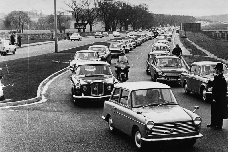 A queue on the A1 south of Wetherby at the junction with the Leeds road in April 1966 which carried a line of cars right back to Collingham.