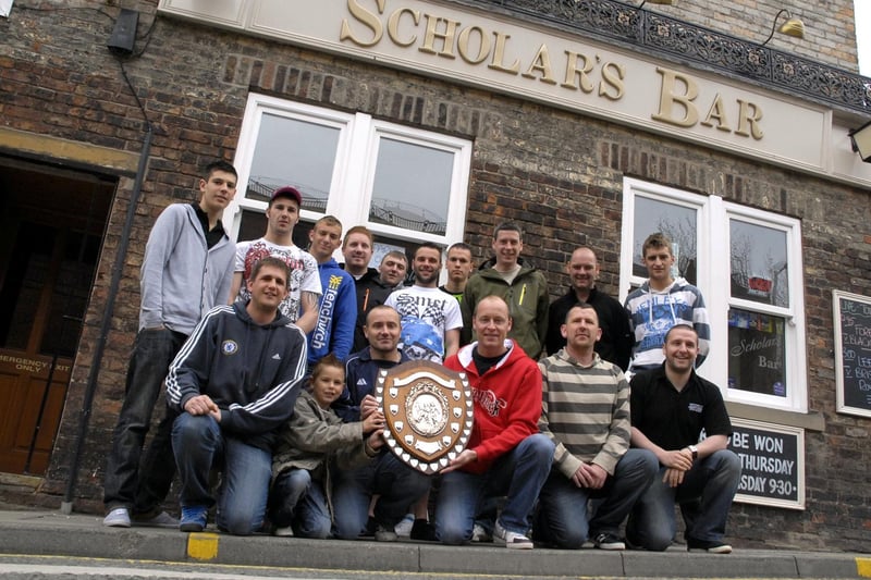 West Pier FC Division Three trophy presentation at Scholars Bar. The players and managers are pictured with the trophy shield.
