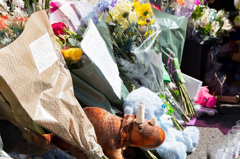 Flowers, soft toys and letters were among tributes left to George Arthur Hinds.